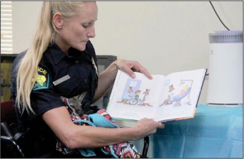 School Resource and Dublin Police Department Officer Brandi Hoffman along with her wallaby Mouse made a guest appearance at the Dublin Public Library’s Read with DPD event Thursday, July 6. Wyndi Veigel | Citizen staff photo
