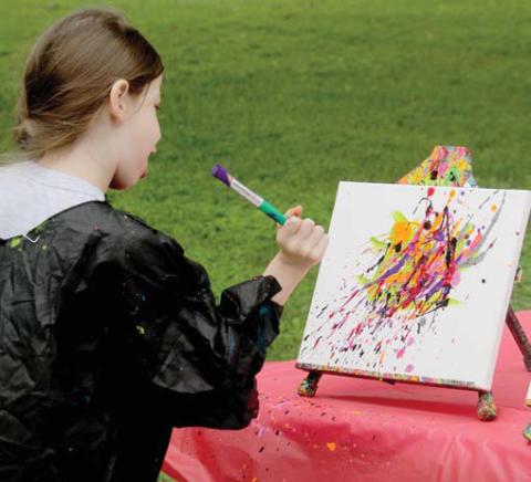 Kids of all ages enjoyed splatter painting, other craft projects, snacks and reading fun at the Dublin Public Library Wednesday, June 4 with workers from Cross Timbers Fine Arts Council. Wyndi Veigel-Gaudette | Citizen staff photo