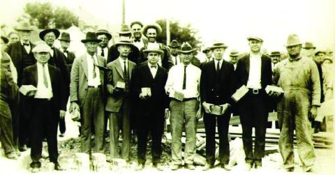 The city mayor and councilmen held brick during the groundbreaking for paving of downtown. It took place on May 12, 1926 at the corner of Live Oak and Patrick Street. Courtesy photo