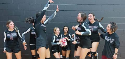 The Lingleville JV Lady Cardinals volleyball team and coach Lauren Wilson celebrate after claiming the top spot in the Strawn Tournament Friday, Aug. 16. The team only lost two sets in five games. Brandon Huaght | Submitted photo