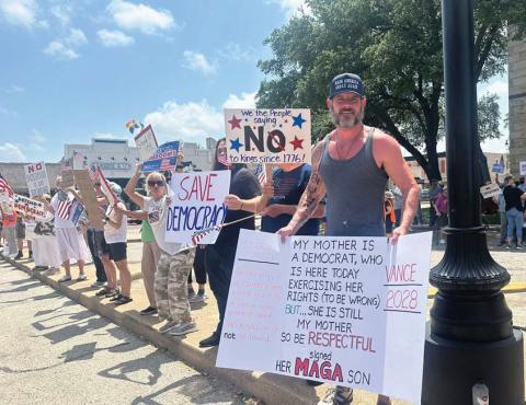 A crowd of people showed up Saturday, June 14 for the ‘No Kings’ protest in downtown Stephenville. The peaceful protest had no police issues other than an individual with a heat-related injury. Sara Vanden Berge | Beneath the Surface News
