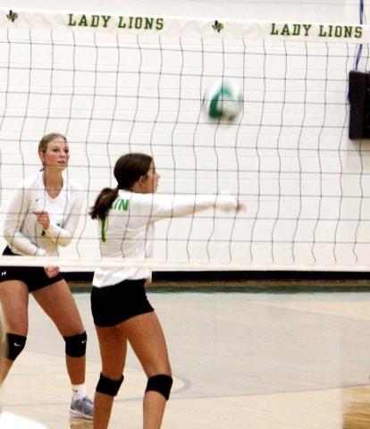 Paul Gaudette | Citizen staff photo JV Lady Lions volleyball players return the ball to Hico opponents during a Saturday morning scrimmage at Dublin High School.