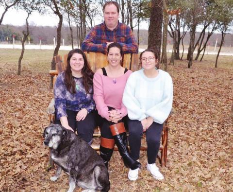 Jennifer Lowery with husband, Jeff, and daughters, Gabrielle Richardson and Shelby Richardson