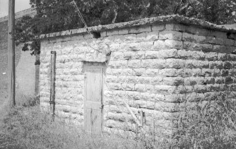 The Dublin calaboose was built in 1889 and may have been rebuilt or enlarged in 1898. Jails such as this were often used when drunkenness or rowdy behavior became a problem. The pathway between it and the local saloon and pool hall was used regularly.. | Dublin Historical Museum archive photo
